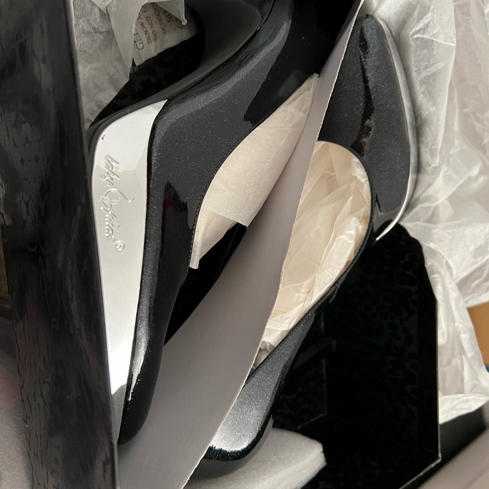Baby Phat dark blue and silver high heel shoes. New never used.